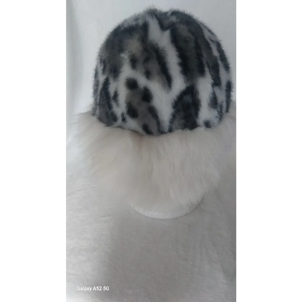 Enjoy Wild Elegance with this Faux Fur Leopard Print Hat White and black